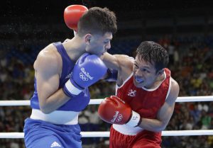 Philippines' Charly Coronel Suarez, right, fights Britain's Joseph Cordina during a men's lightweight 60-kg preliminary boxing match at the 2016 Summer Olympics in Rio de Janeiro, Brazil, Saturday, Aug. 6, 2016. (AP Photo/Frank Franklin II)