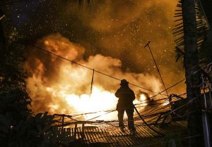 A fire razed the residential in Laon Compound Brgy. Almazan Uno and Samapguita Compound Brgy. Pilar Village. Almost 1000 families are rendered homeless and reached 5th alarm. ( Jun Ryan Arañas )